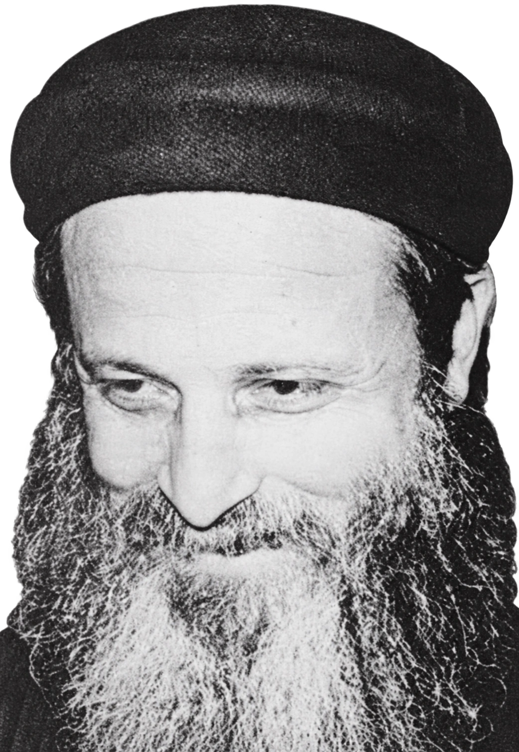 Black-and-white portrait of Father Bishoy Kamel with a transparent background